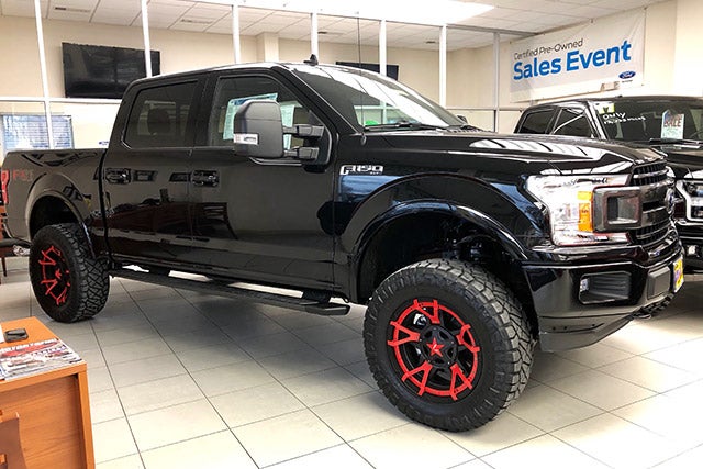 Black F-150 with Jimmie Allen Red Rims at All American Ford in Old Bridge in Old Bridge NJ