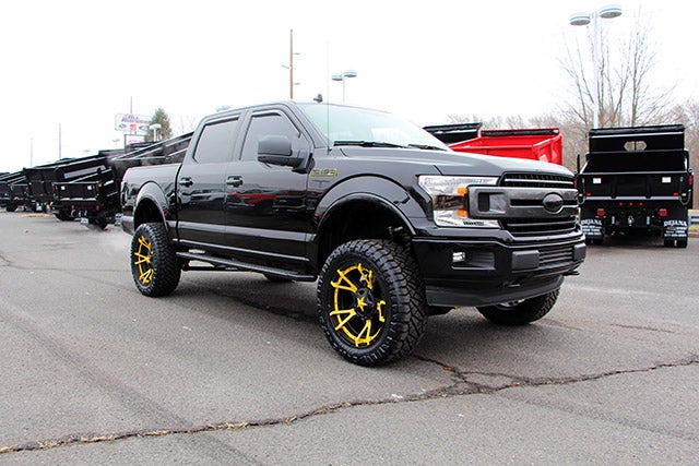 Custom Black F-150 with Jimmie Allen Yellow Rims at All American Ford in Old Bridge in Old Bridge NJ