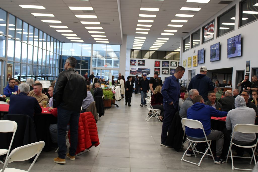 The All American Ford in Old Bridge showroom transformed into a poker tournament